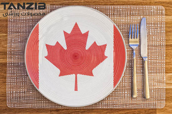 عکس چاقو چنگال و بشقاب منقش به پرچم کانادایی با بک حصیری و چوبی برای رژیم کانادایی اصلی چیست