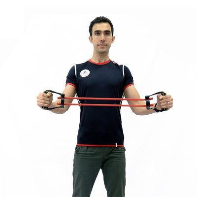 مرد ورزشکاری در جال استفاده از کش ورزشی سی ایکس تن زیب مدل قرمز 50 پوند دوبل 45 سانت