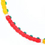 حلقه لاغری هولاهوپ تن زیب مدل جادویی پیچشی از نمای نزدیک قطعات قرمز و زرد با قارچ های سبز